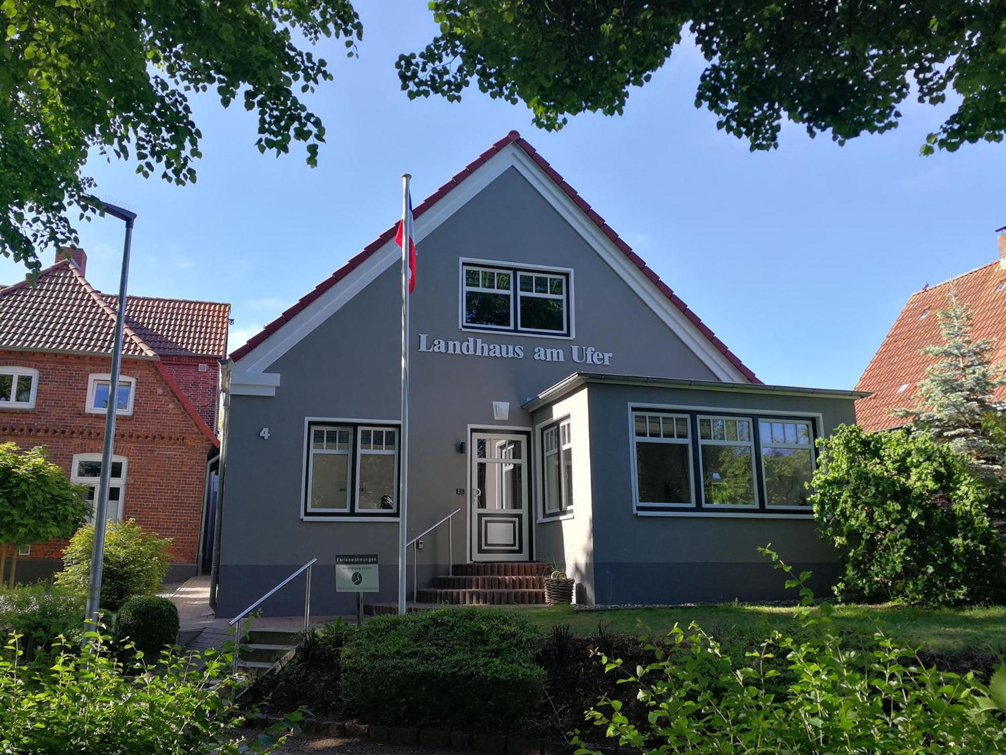 Landhaus Am Ufer - Wohnung 1 Хайлигенхафен Екстериор снимка